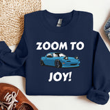 a blue car with the words zoom to joy on it