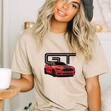 a woman wearing a t - shirt with a red car on it
