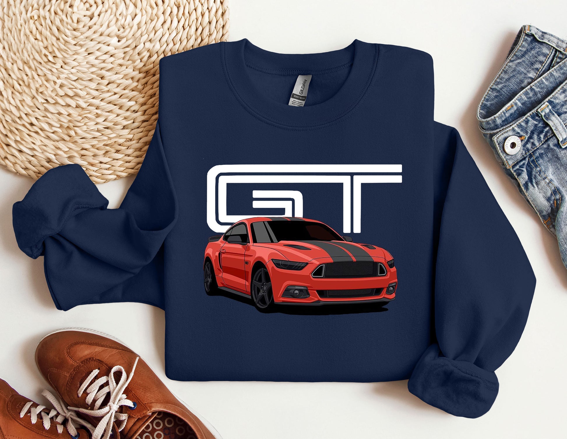 a blue sweatshirt with a red mustang on it