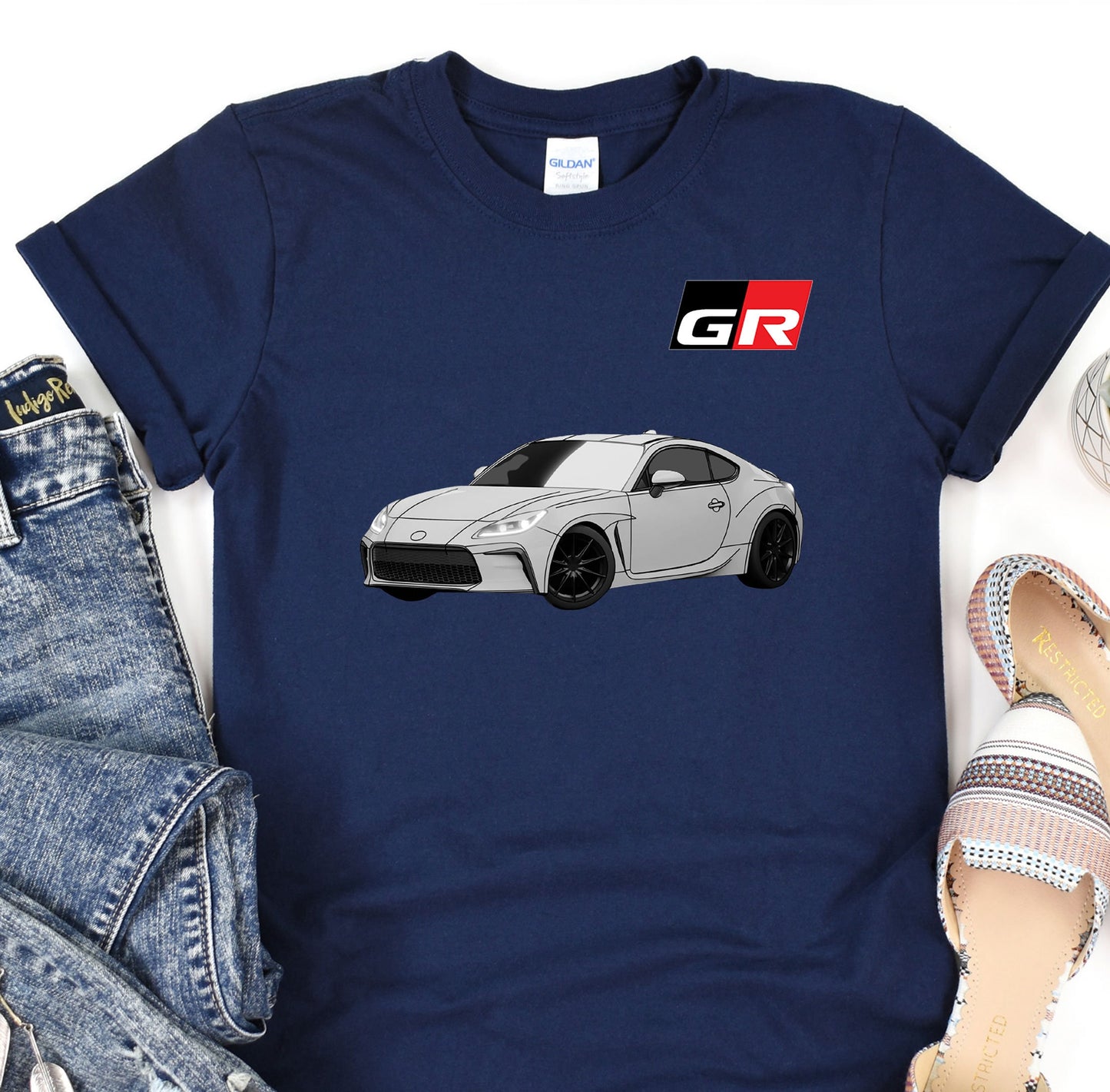 a t - shirt with a picture of a car on it