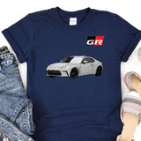 a t - shirt with a picture of a car on it