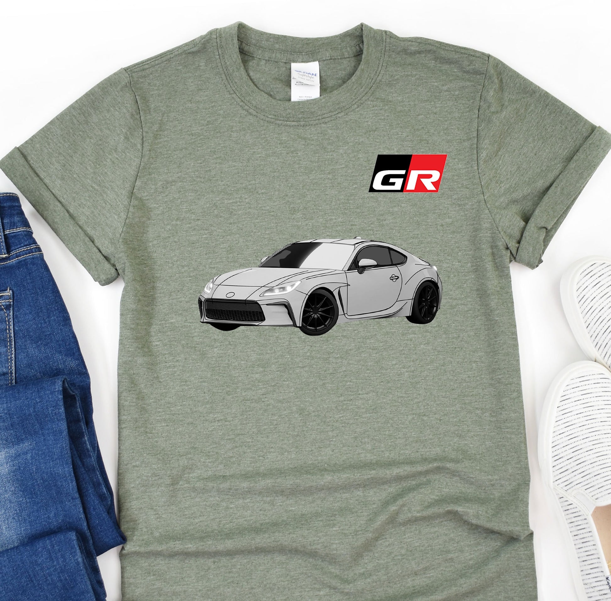 a t - shirt with a picture of a car on it