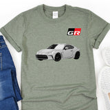 a t - shirt with a picture of a car on it
