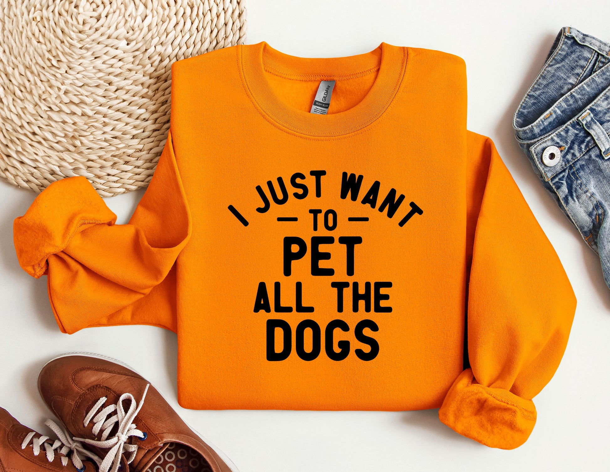 an orange shirt that says i just want to pet all the dogs