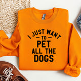 an orange shirt that says i just want to pet all the dogs