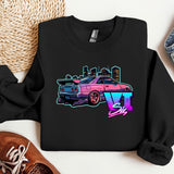 a black shirt with a pink car on it
