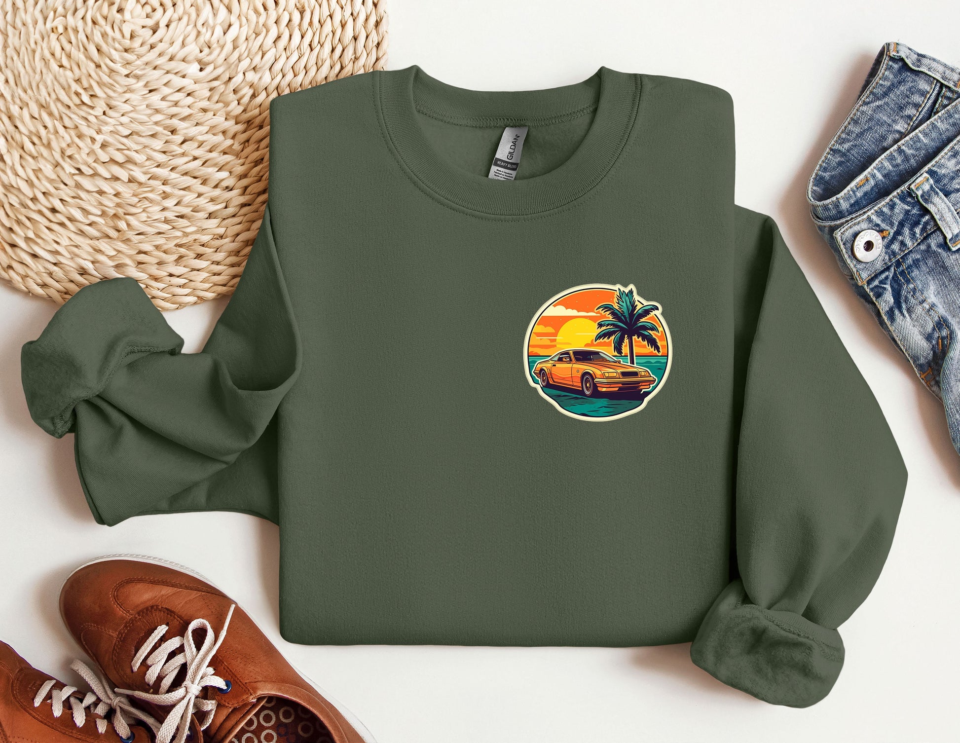 a green sweatshirt with a palm tree on it