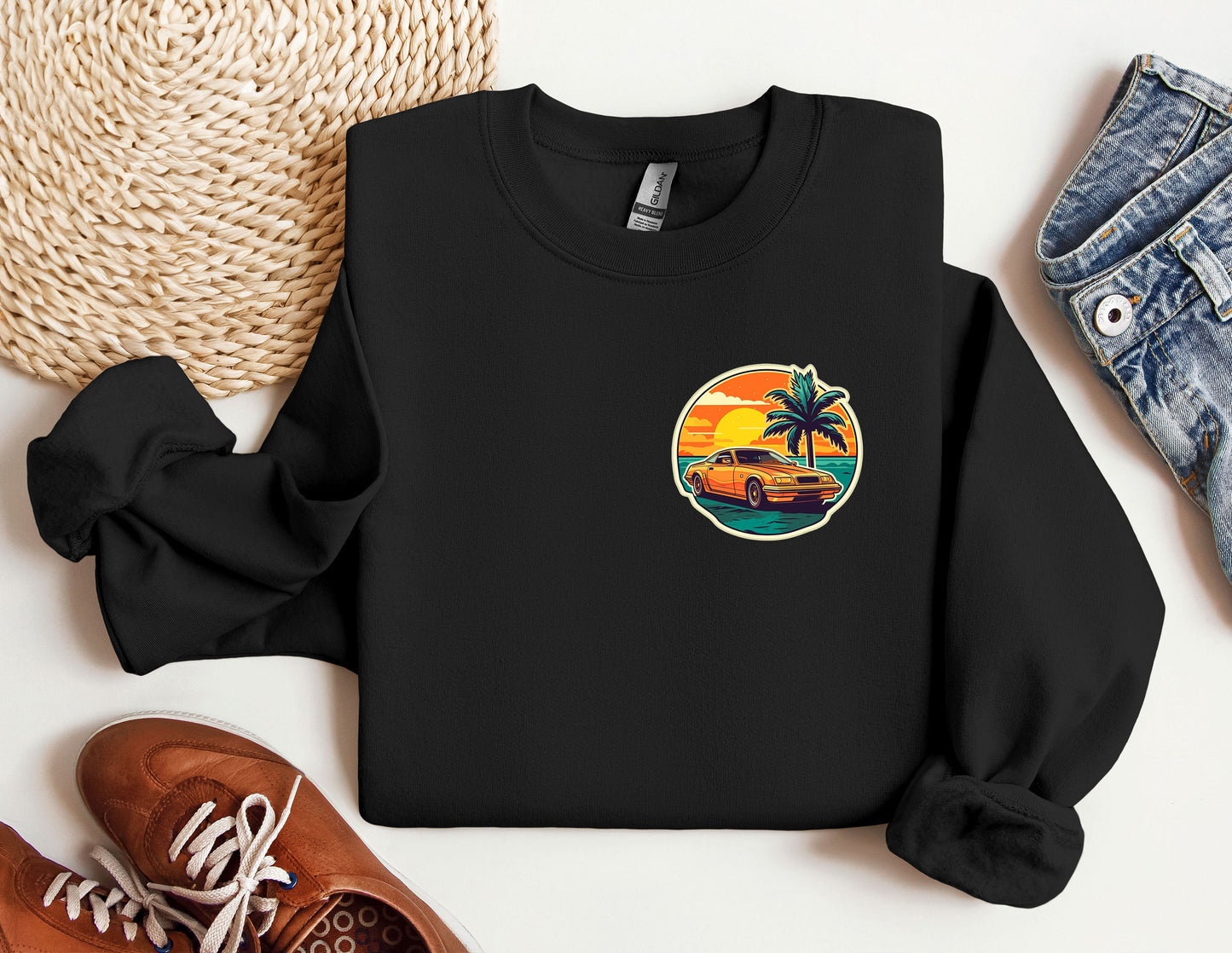 a black sweatshirt with a palm tree on it