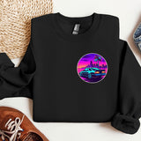 a black sweatshirt with a picture of a car and palm trees