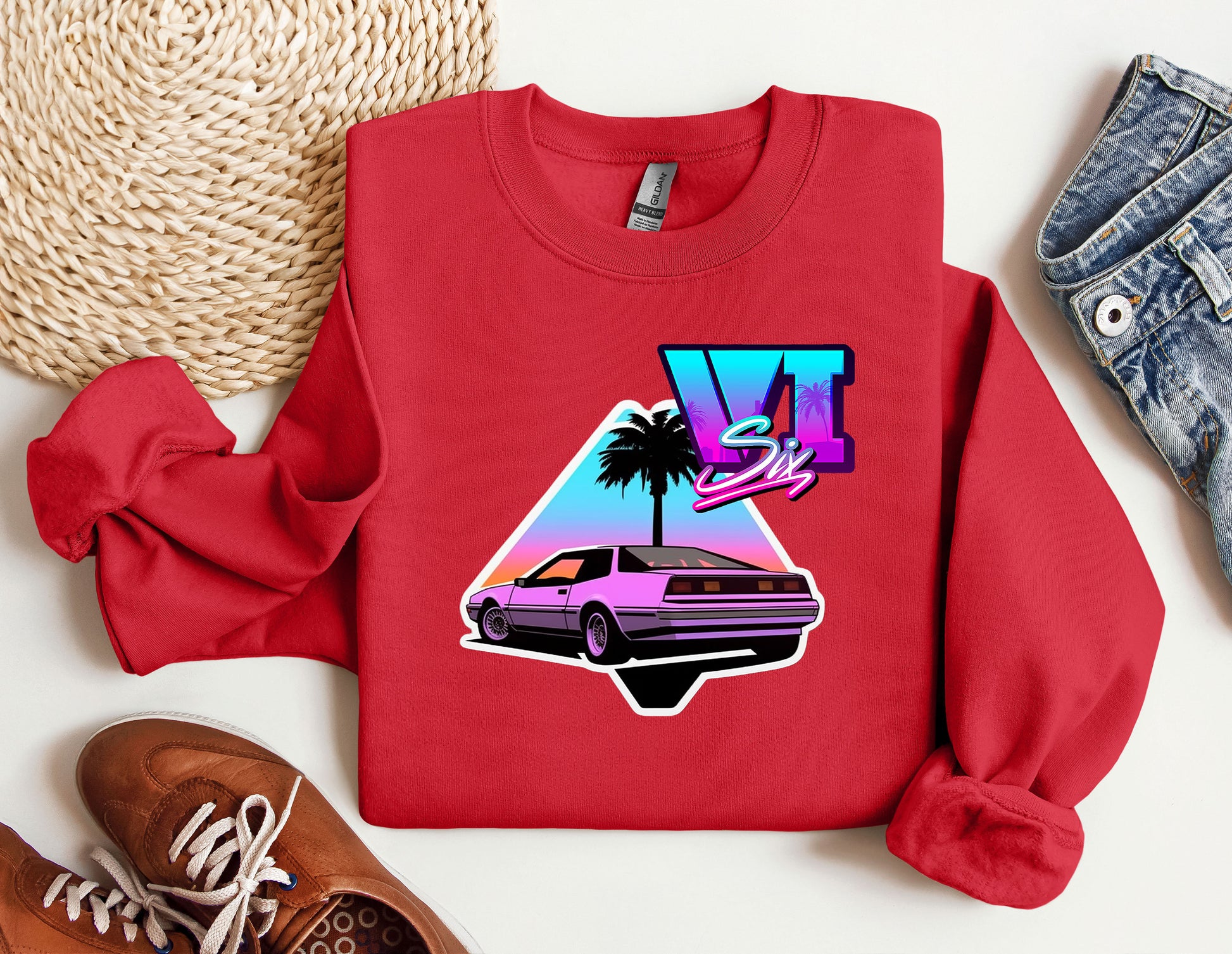 a red shirt with a picture of a car on it