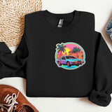 a black sweatshirt with a picture of a car and palm trees