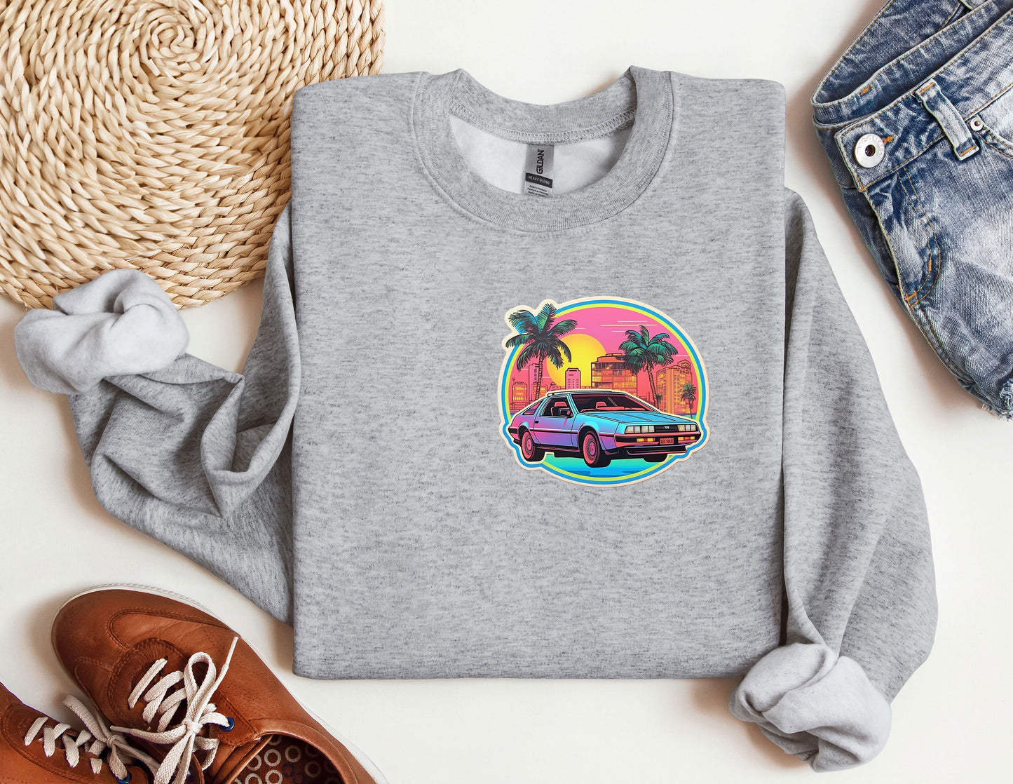 a grey sweatshirt with a picture of a car on it