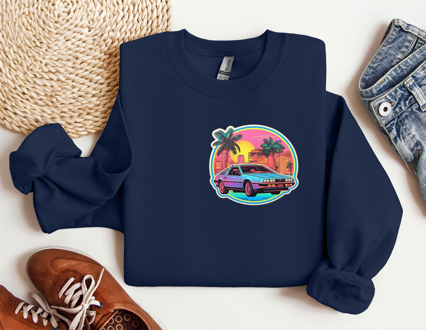 a blue sweatshirt with a picture of a car on it