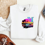 a white shirt with a v on it next to a pair of shoes