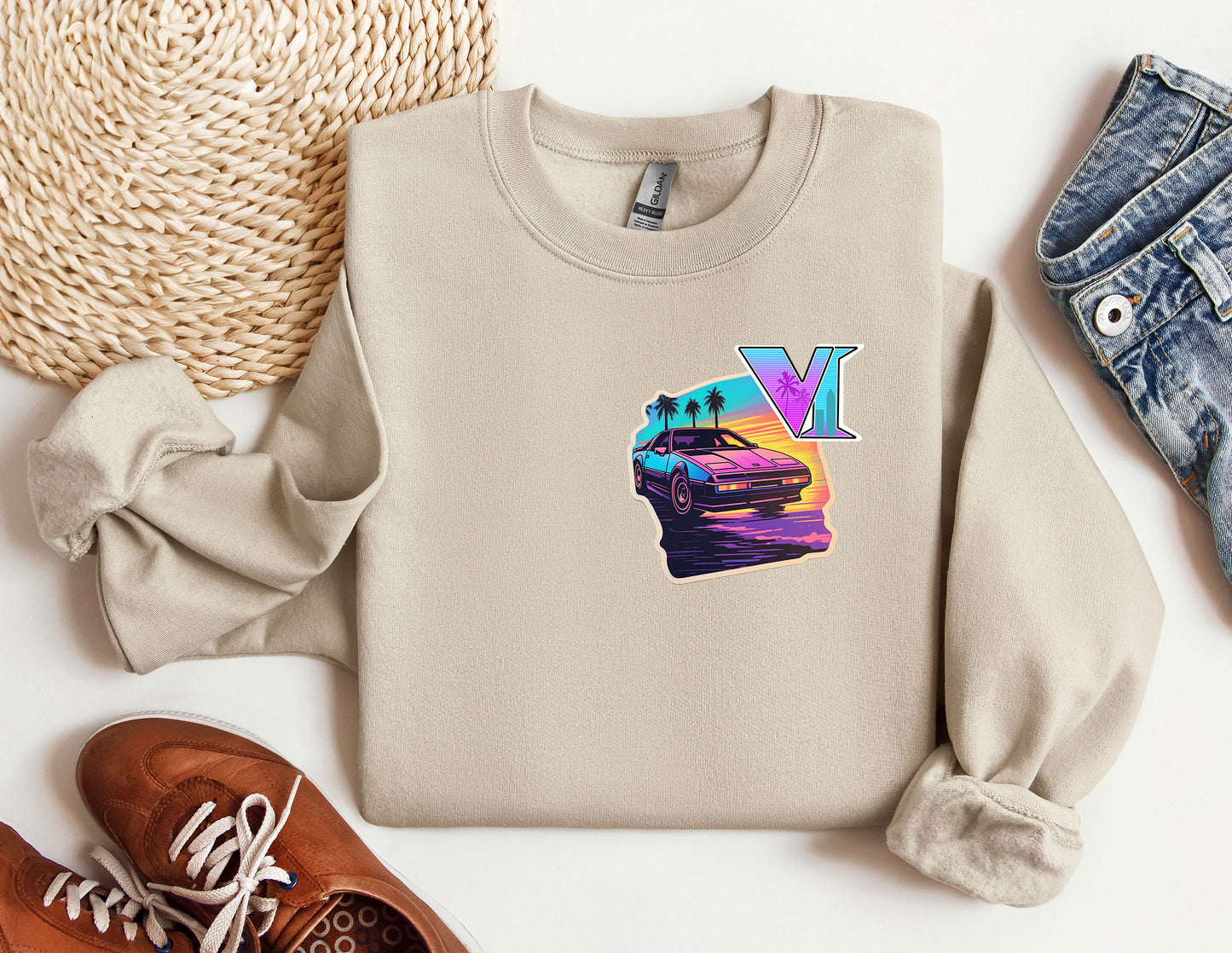 a sweater with a picture of a car on it