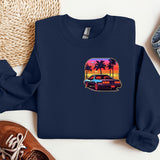a blue shirt with a picture of a car and palm trees
