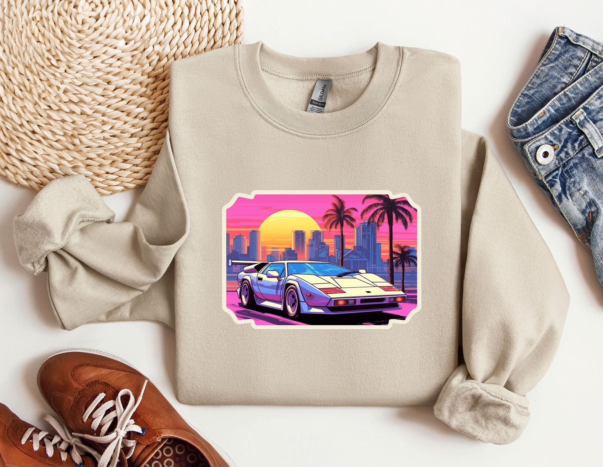 a sweatshirt with a picture of a car on it