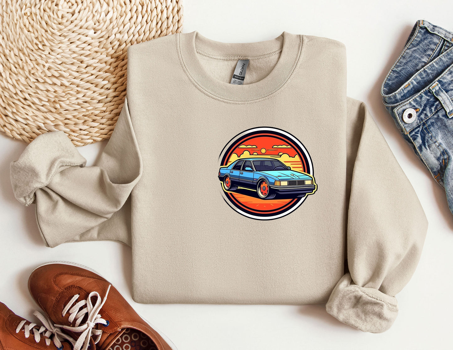 a sweater with a picture of a car on it