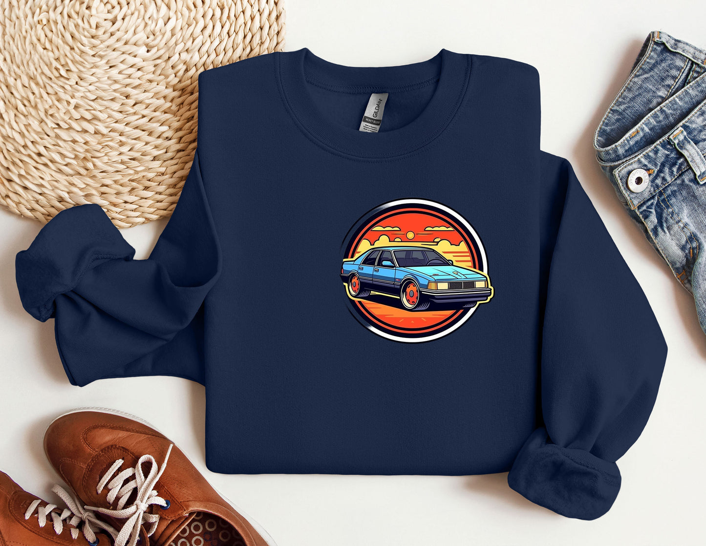 a blue sweatshirt with a picture of a car on it