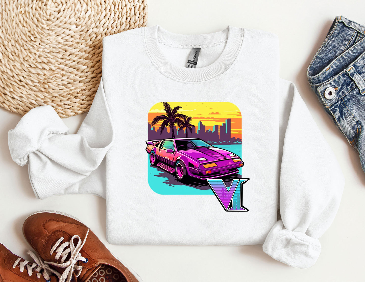 a sweater with a picture of a car on it