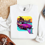 a sweater with a picture of a car on it