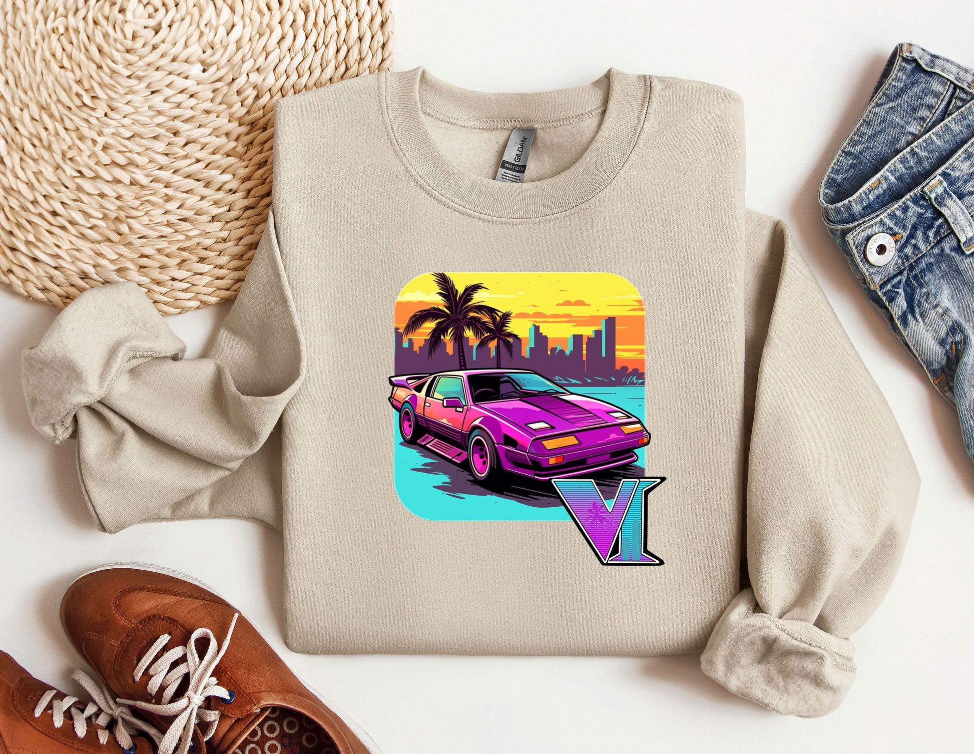 a sweater with a picture of a car on it