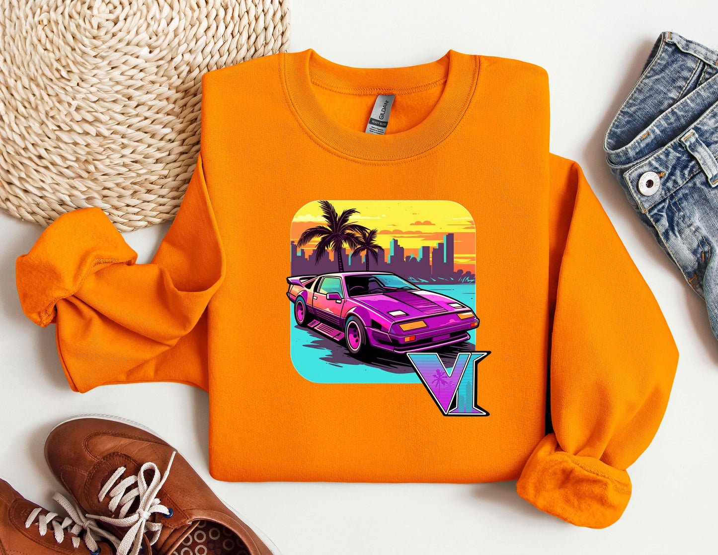 an orange shirt with a picture of a car on it