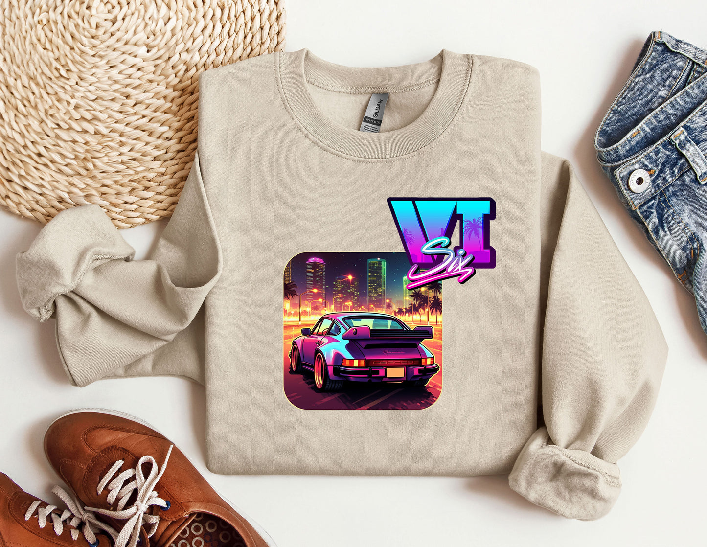 a sweater with a picture of a car on it