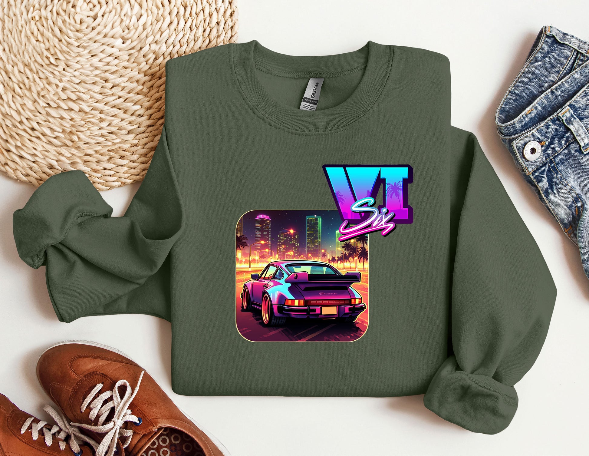 a green sweatshirt with a picture of a car on it