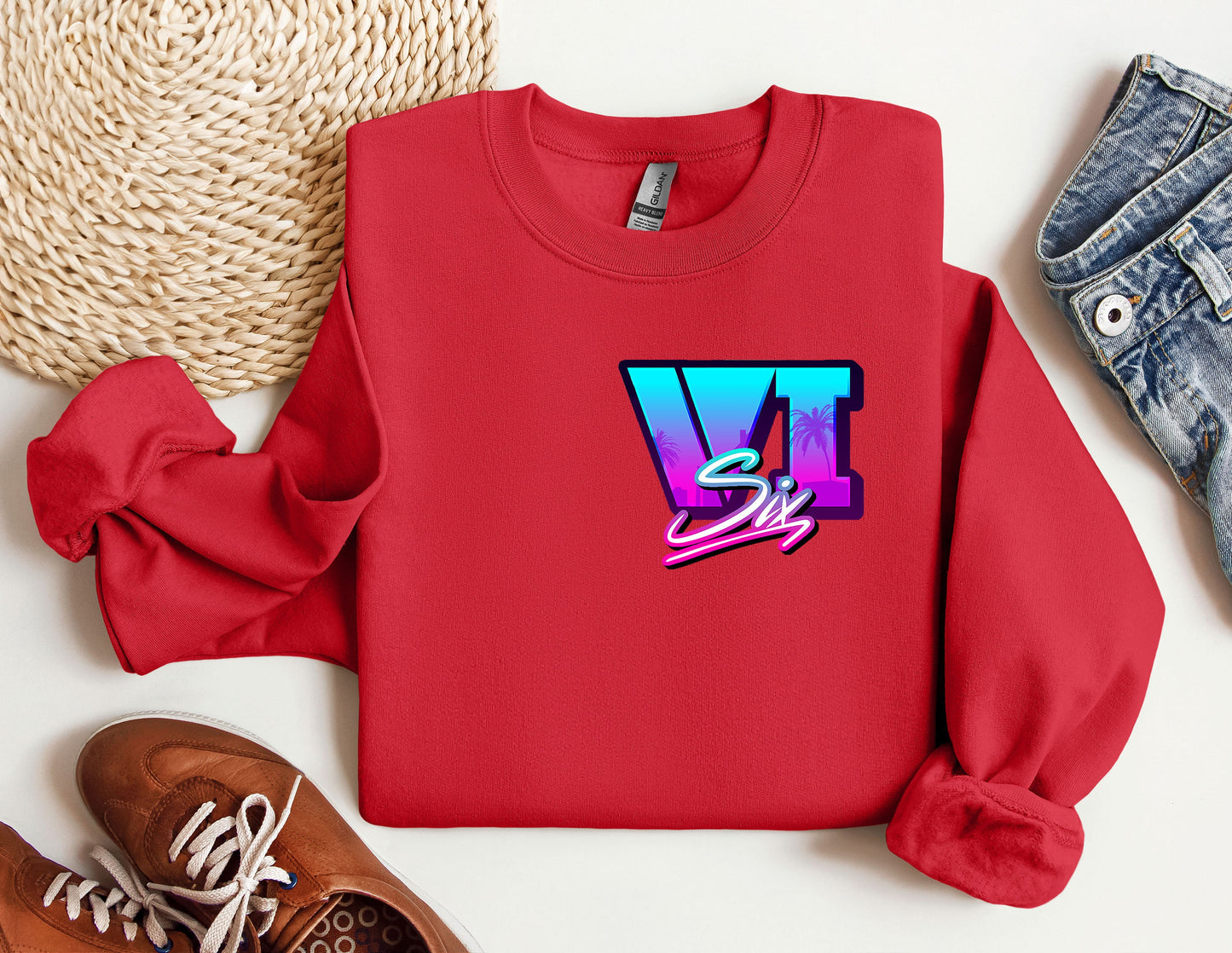 a red sweatshirt with the letter v on it