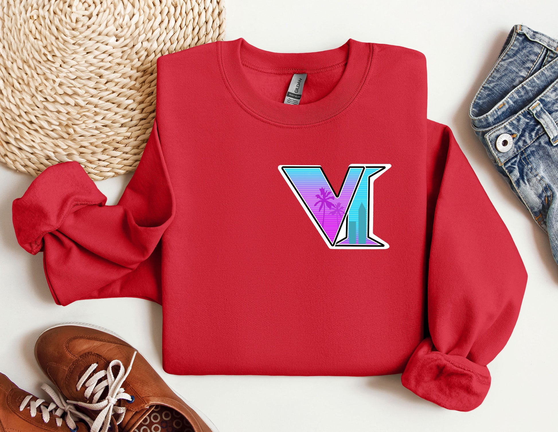 a red sweatshirt with the letter v on it