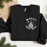 a black sweatshirt with a christmas tree and santa's sleigh on it