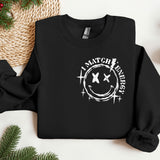 a black sweatshirt with a smiley face on it