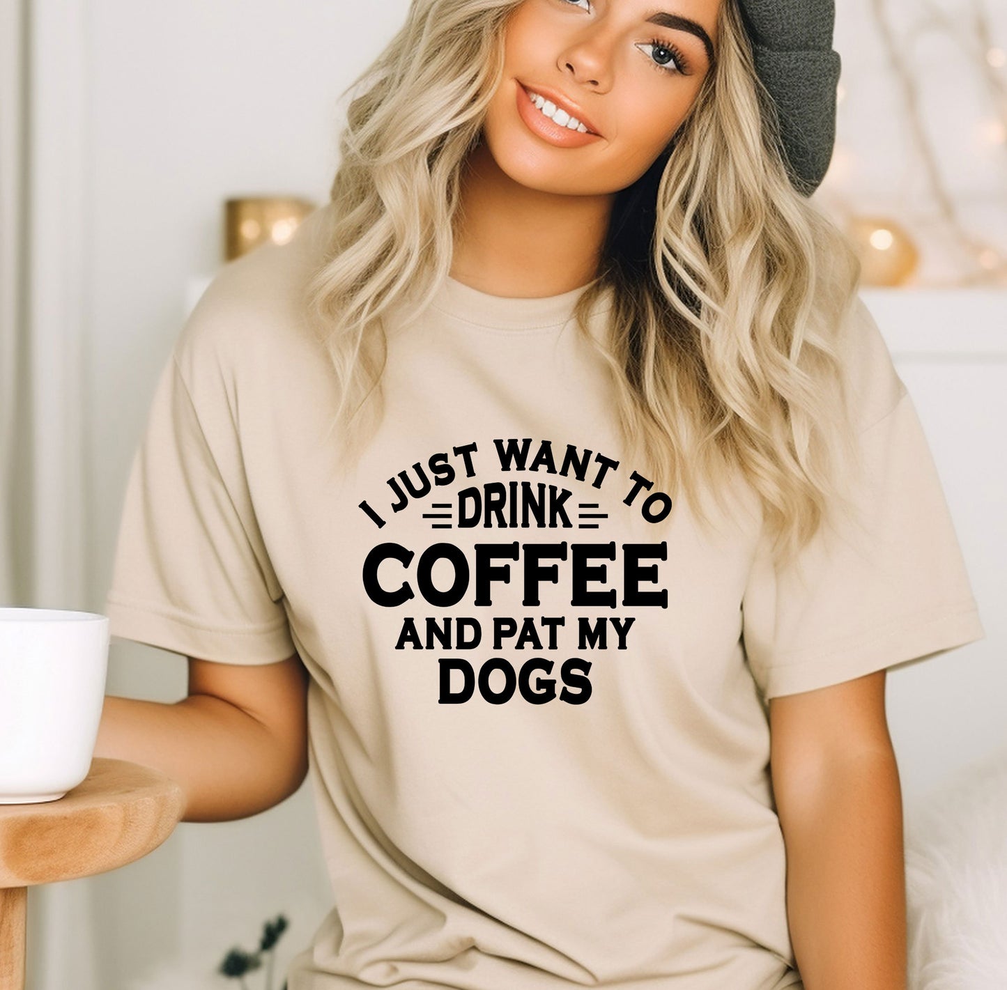 a woman wearing a t - shirt that says i just want to drink coffee and