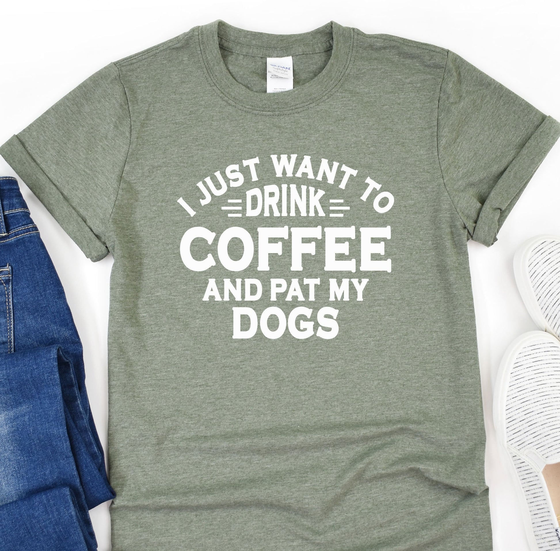 a t - shirt that says i just want to drink coffee and pat my dogs