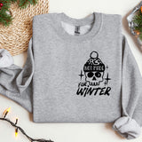 a sweater with a skull and a hat on it