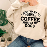 a woman wearing a sweatshirt that says i just want to drink coffee and pat my