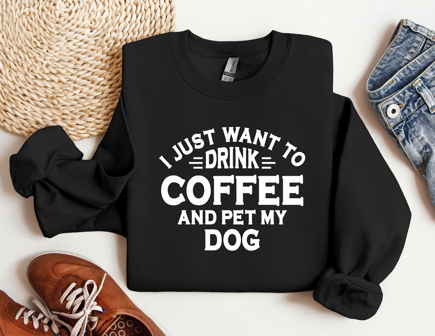 a sweatshirt that says i just want to drink coffee and pet my dog