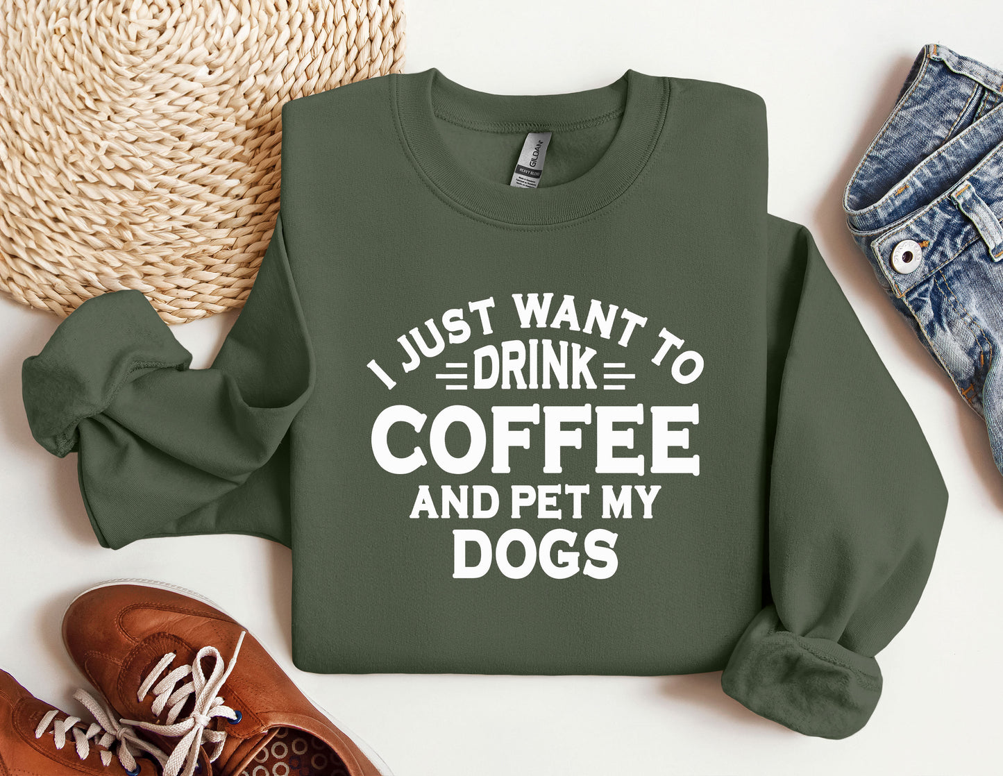 a sweatshirt that says i just want to drink coffee and pet my dogs