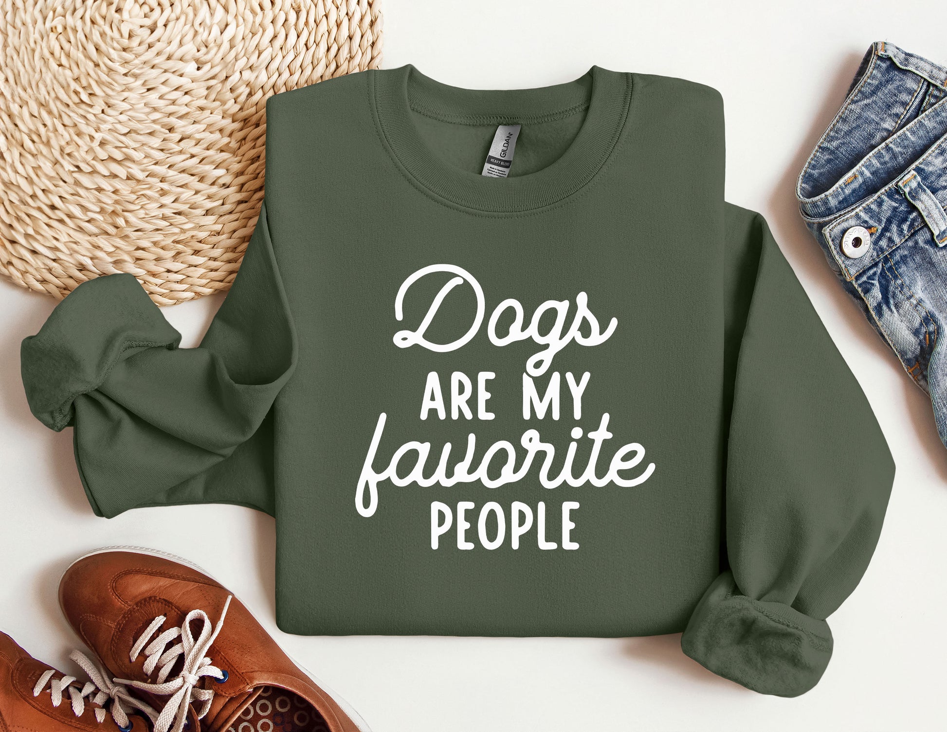 a green sweatshirt that says dogs are my favorite people