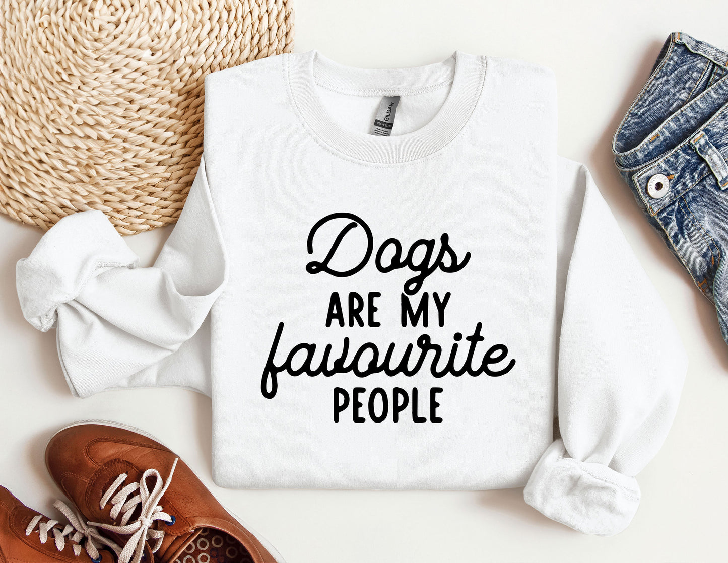 a white shirt that says dogs are my favorite people