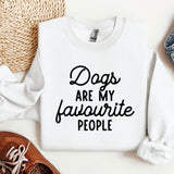 a white shirt that says dogs are my favorite people