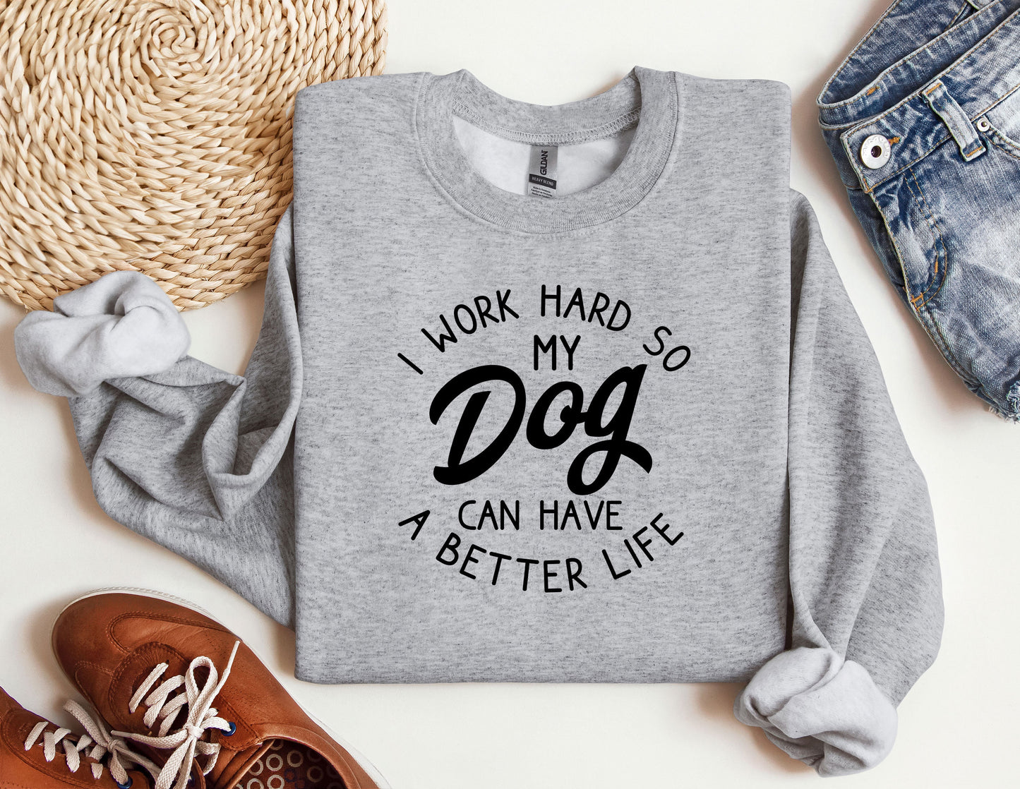 a sweatshirt that says i work hard so my dog can have a better life