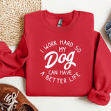a red sweatshirt that says i work hard so my dog can have a better life