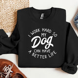 a black sweatshirt that says i work hard so my dog can have a better life