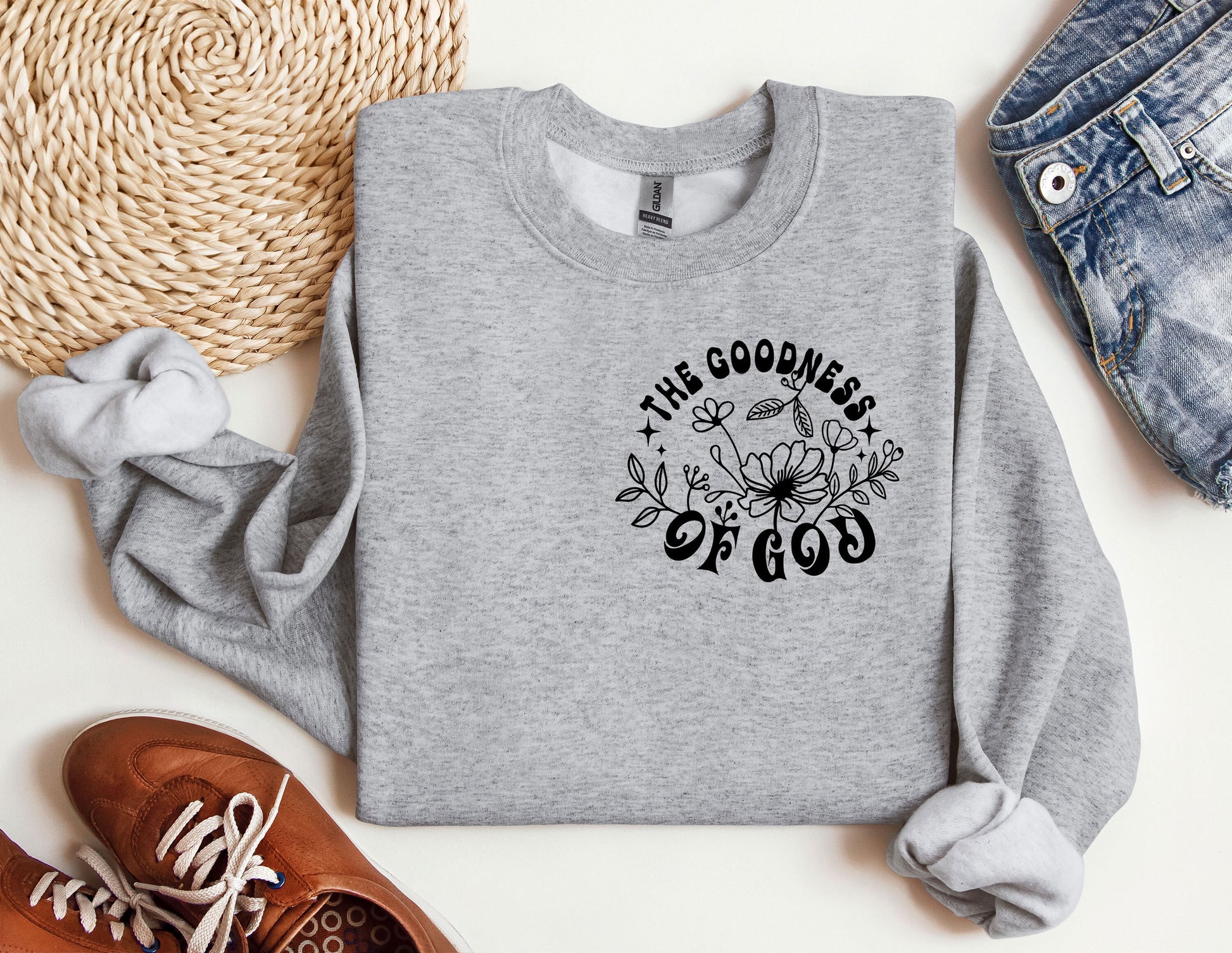 a sweatshirt with the words the goodness of god on it