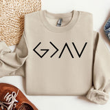 a pair of shoes and a sweater on a white surface