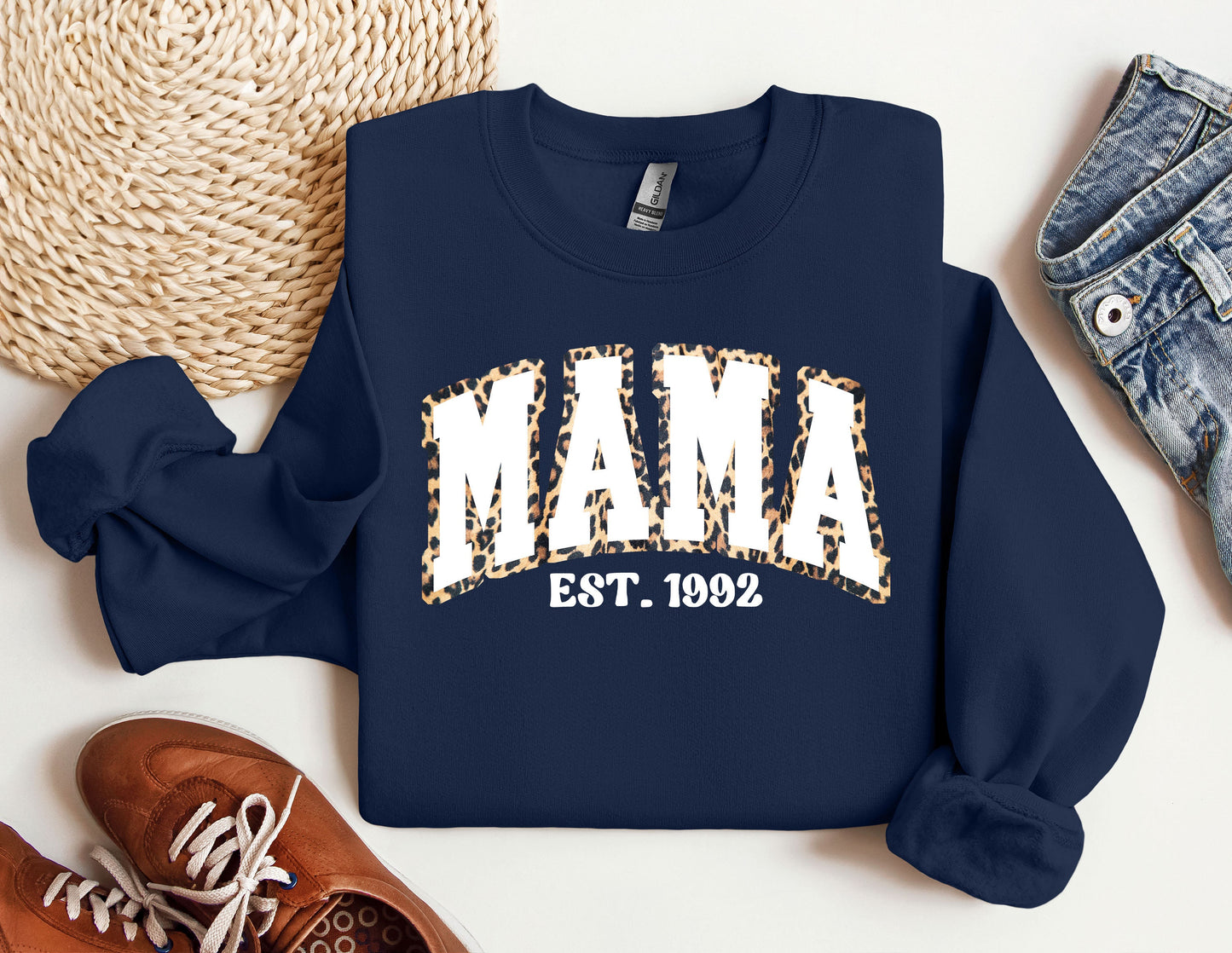 a blue sweatshirt with the word mama printed on it