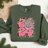 a green sweatshirt with a disco ball on it