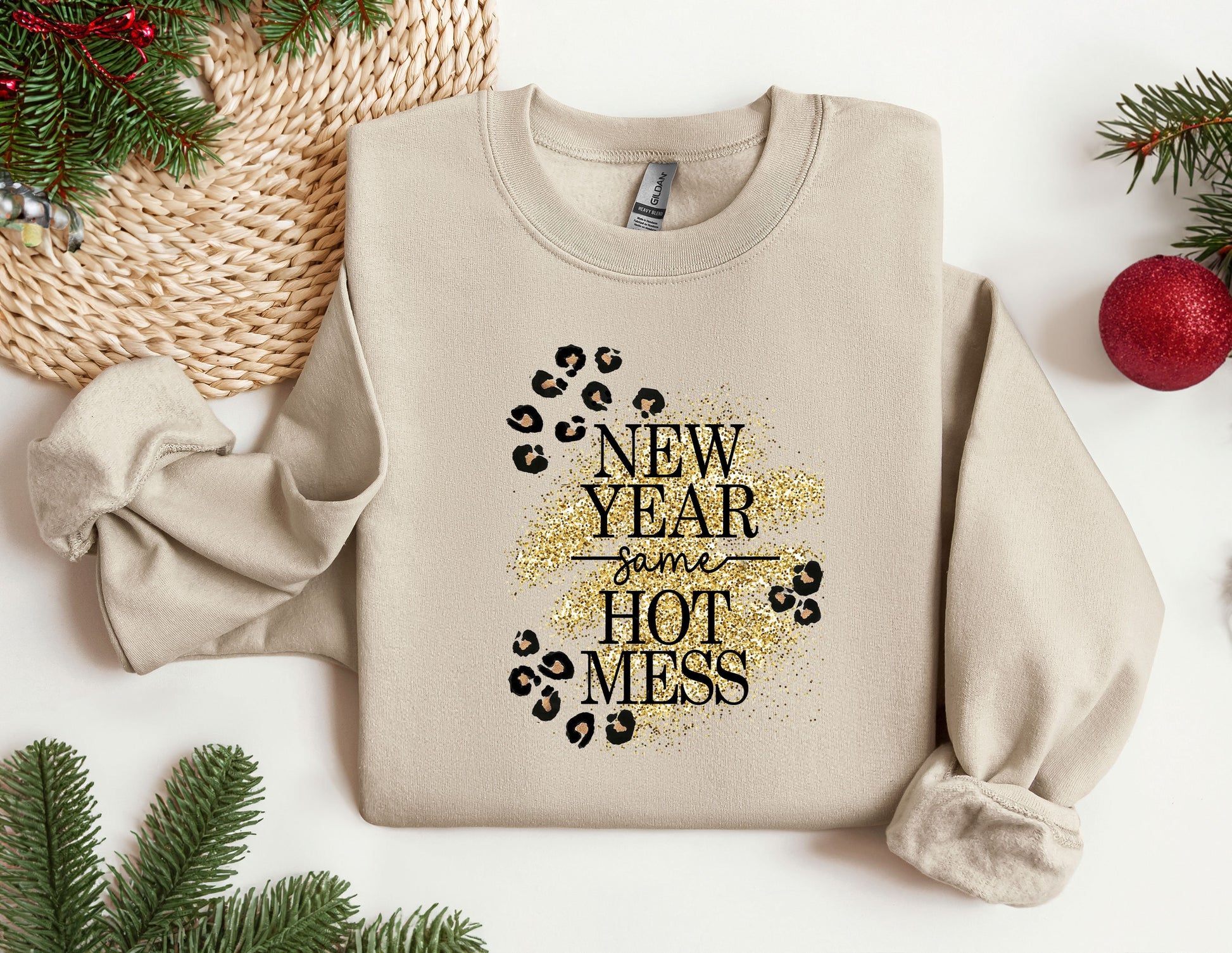 a sweater with the words new year some hot mess on it